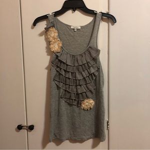 Gray jersey tank top with silky ruffles and crepe flowers